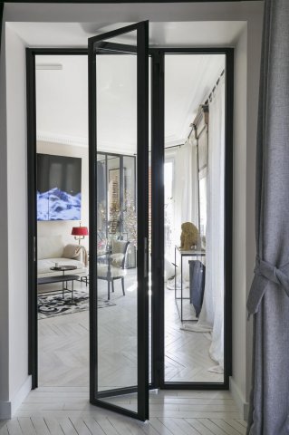Porte coulissante atelier d'artiste vitrée et en acier - 1 vantail ou 2